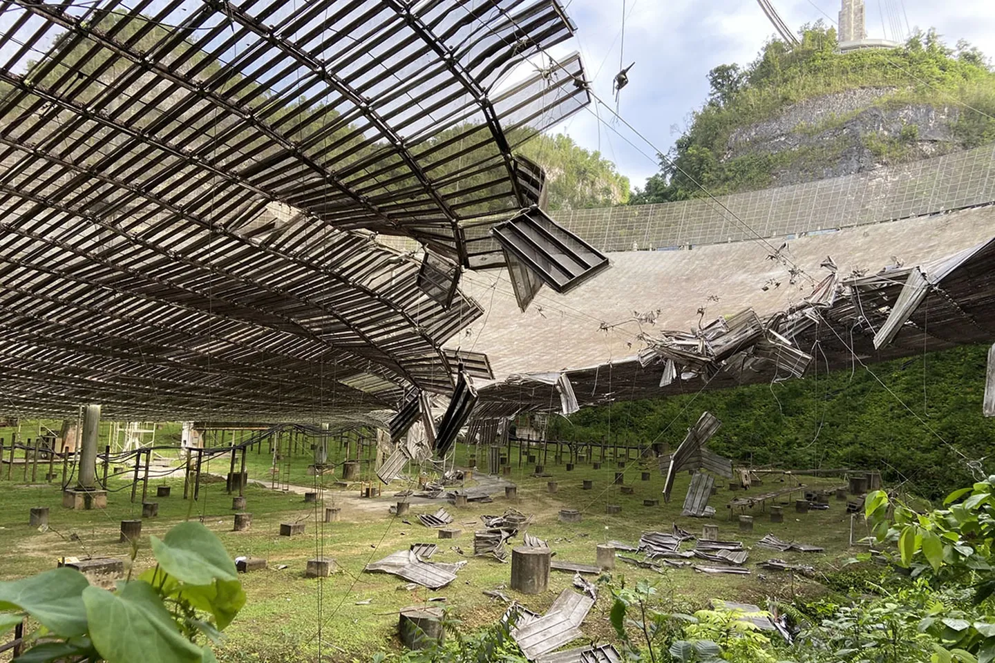 Overhead image of a broken Arecibo Telescope